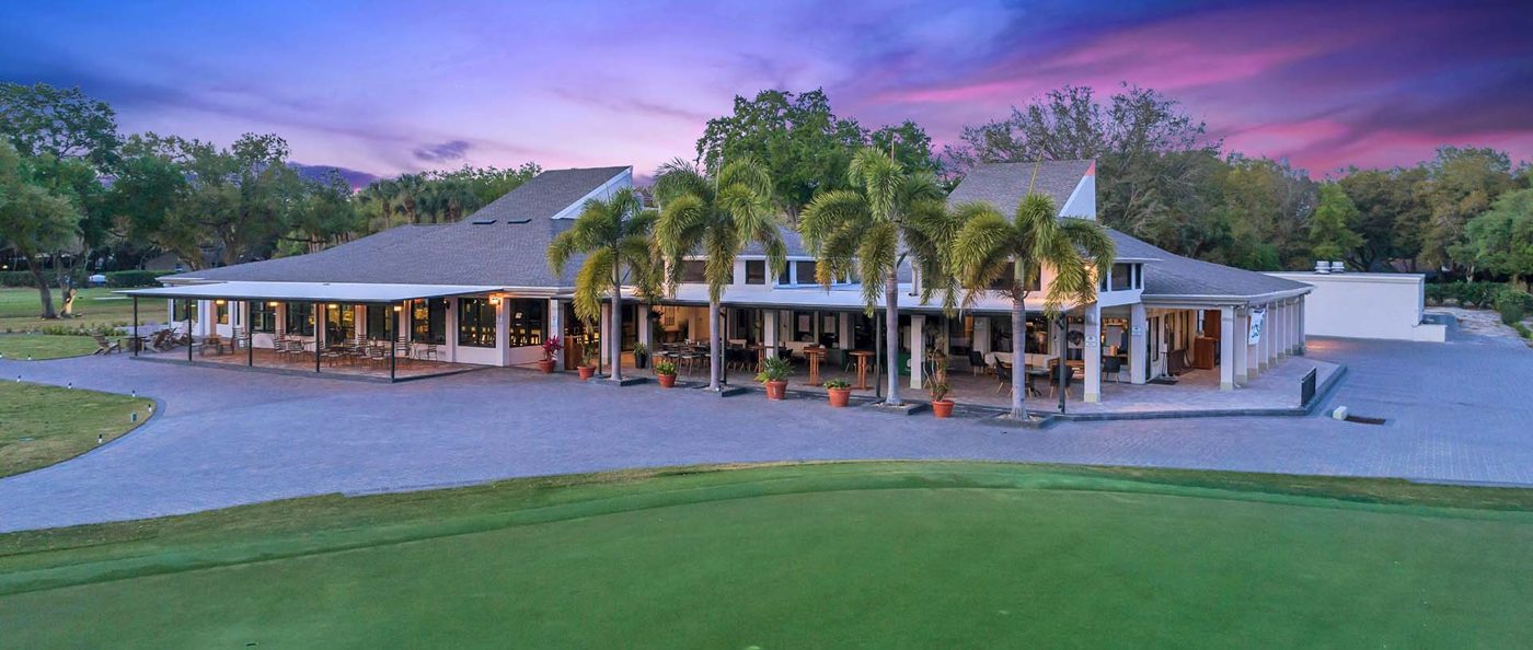Orange Tree Golf Club clubhouse at dusk